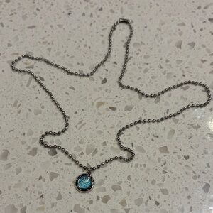 Elegant St. Christopher protect us pendant in turquoise with black outline